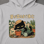 Cat gardening 芽が出るまで休む 菜園でひと休みの黒猫 パーカー フーディ｜フロントプリント