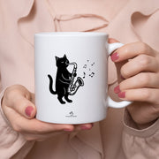 マグカップ 猫イラスト 猫 エコ バッグ サックスを吹く｜猫好きにおすすめの面白い猫グッズ プレゼントにも最適
